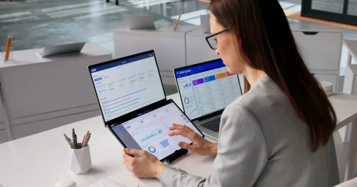 businesswoman-analyzing-data-dashboard