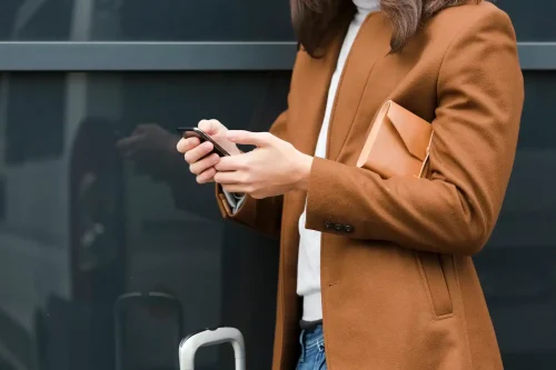 close-up-young-man-checking-her-phone